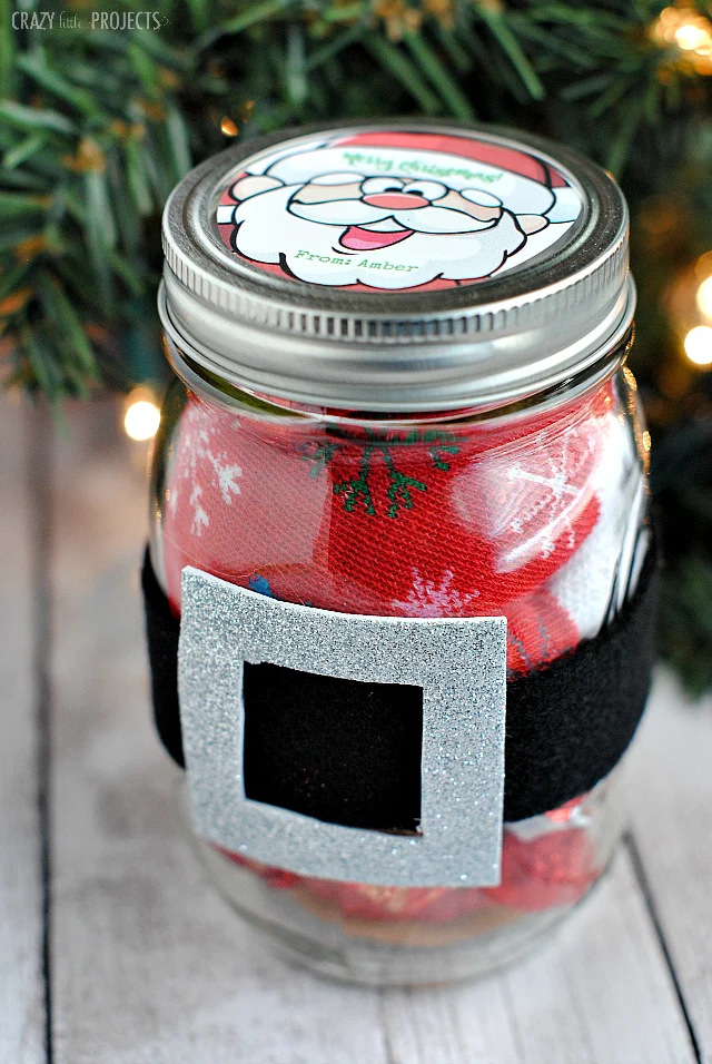 Cute Christmas Gift Santa Belt Jar placed on a table