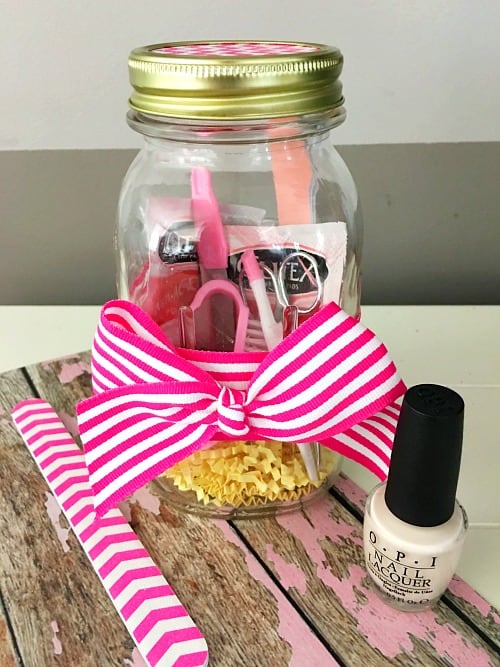 Mani Pedi in a Jar Whit a Red and White Bow Around