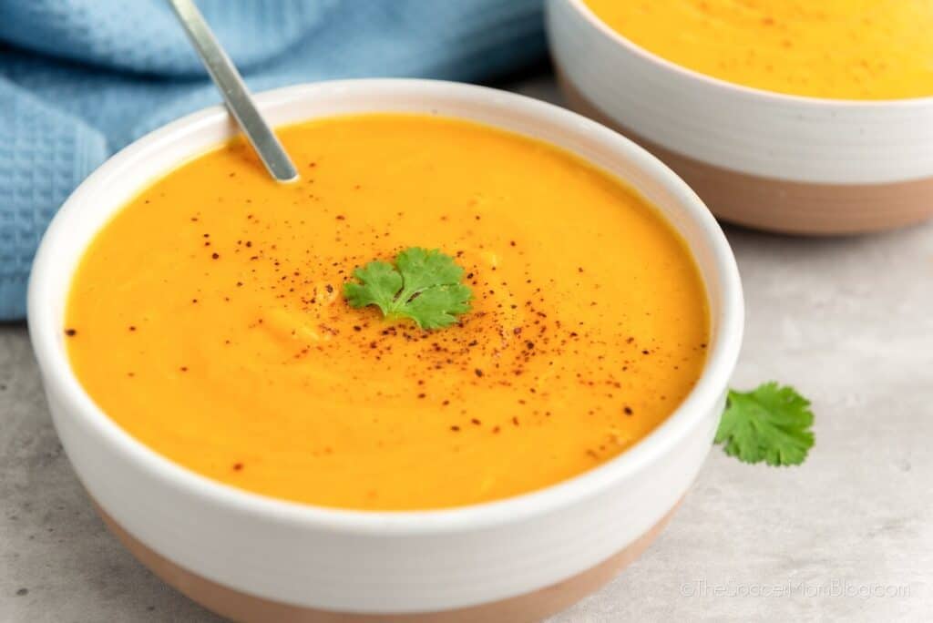 Slow Cooker Butternut Squash Soup served in a white bowl