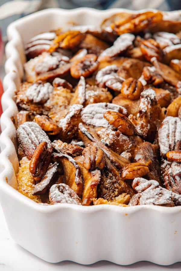 Baked apple French toast casserole with cinnamon, custard, and caramelized apple slices — an easy make-ahead Christmas brunch dish.