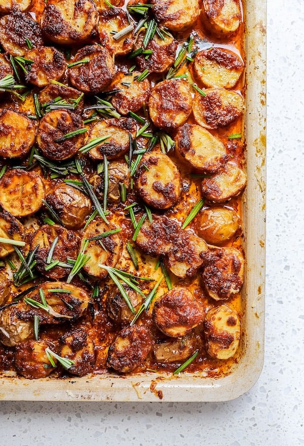Crispy air fryer Parmesan potatoes in a white bowl — quick and easy Christmas side dish recipe.