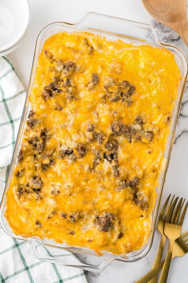 Golden tater tot breakfast casserole baked with eggs, sausage, and melted cheese — a cozy make-ahead Christmas breakfast.